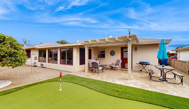Sunny home with covered patio, grill, pool, tennis, hot tub, full kitchen, & AC