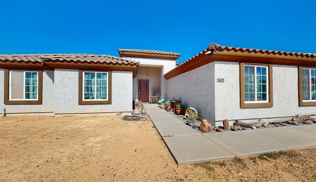 Sunny home with great backyard, home office, gym & convenient location