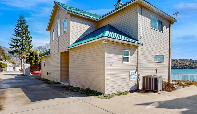 Sunny, lakefront home with huge patio, floating dock & 2 buoys