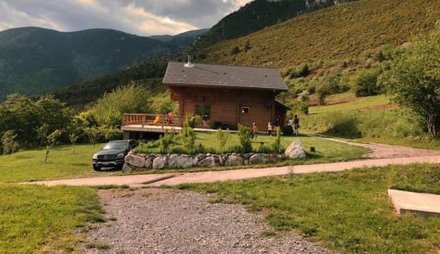 Sunny modern wooden chalet with garden