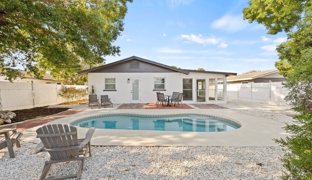 Sunny Palmetto Oasis: 4BR Home with Private Pool by RedAwning