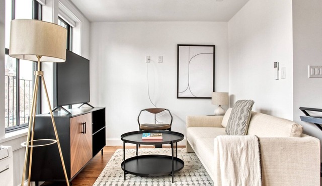 Sunny South End 1BR w/in-unit W/D, steps to restaurants, by Blueground