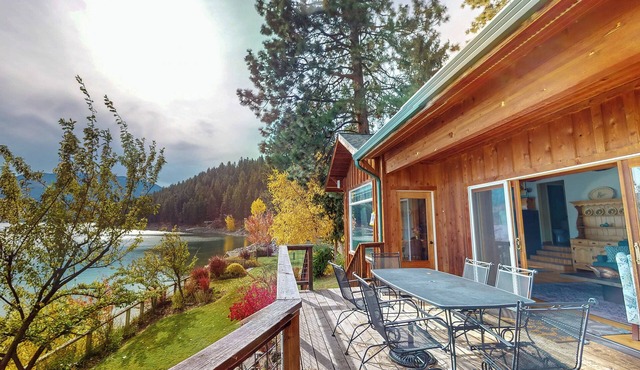 "Sunrise" a lakefront retreat with stunning views, private dock, deck, full kitchen, and cozy spaces—perfect for a relaxing Wallowa Lake getaway!