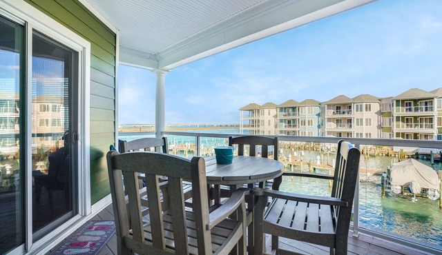 Sunset Bay Villa 206 | Luxury Condo w/Waterside Balcony, Gourmet Kitchen + Pool & Fitness