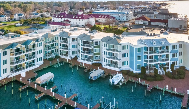 Sunset Bay Villa 221 | Waterfront Views + King Suites + Pool Access + Balcony Living