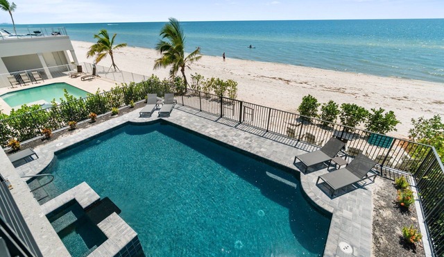 Sunset Beach | Modern, Luxury Beachfront Pool Home | Sleeps 12