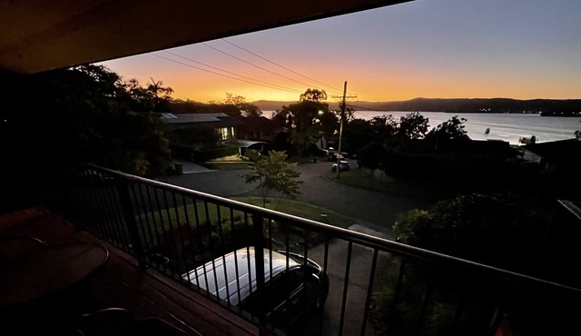 Sunset getaway with panoramic water & mountain view