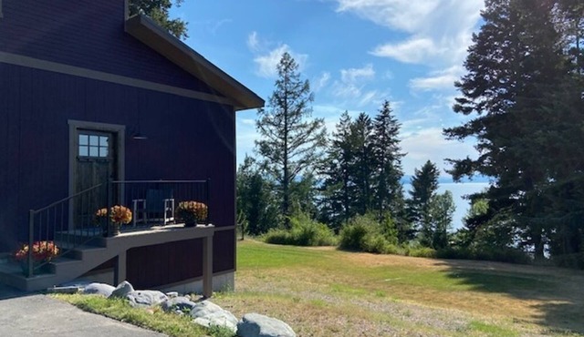 Sunset Heaven Modern Barn House in cherry orchard with Flathead Lake views