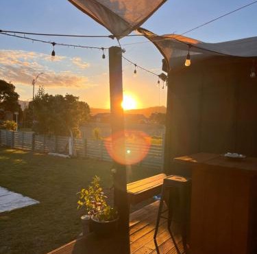 Sunsets on Harbour Kauri or Totara Cabin