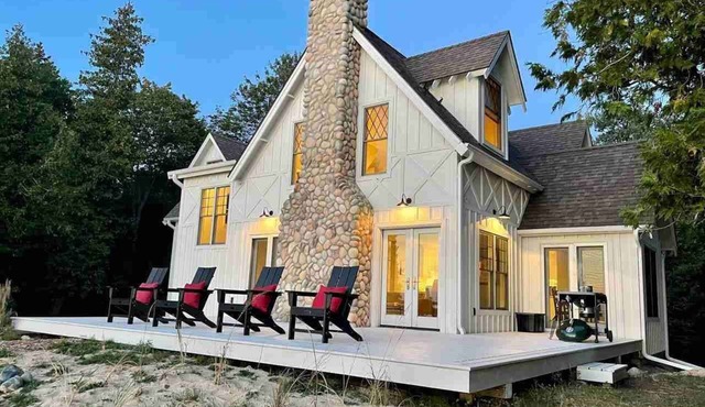 Sunsets, Sandy Beach and Seclusion; enjoy them all at this stunning lake house