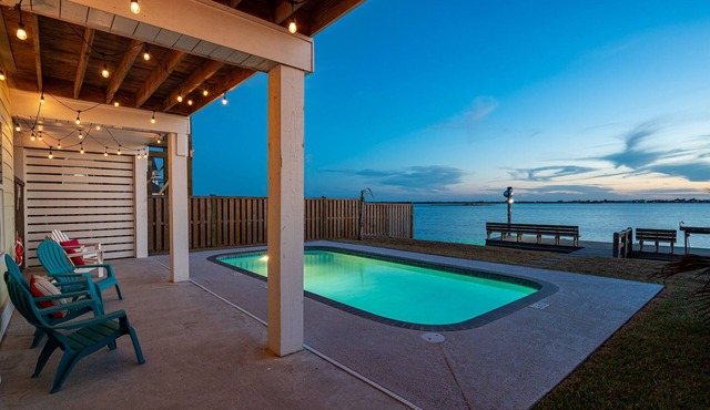 Sunshine Retreat: Waterfront Home, Heated Pool, Outdoor TV Lighted Fishing Pier