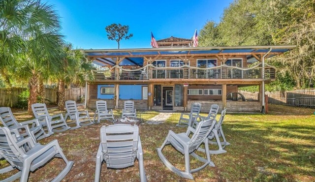 SUPER SIZED 3 STORY RIVERFRONT LODGE WITH UNIQUE VIBES. EVERYTHING INCLUDED!