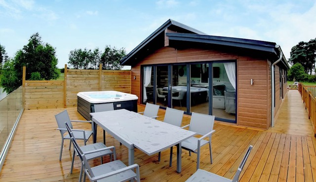 Superb bespoke lodge with four bedrooms sleeping up to ten people.