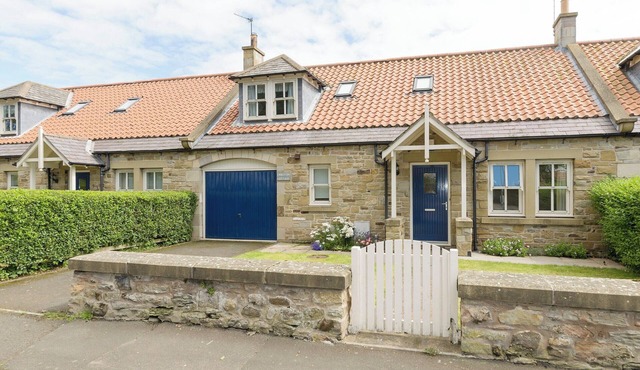 Superb cottage situated on a quiet road with a walled garden to the rear.