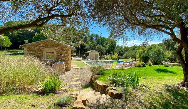 Superb Mas provençal with swimming pool surrounded by oak and olive trees