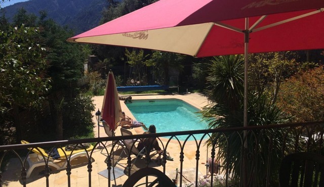 superb villa village center exceptional view. Swimming pool and wooded grounds.