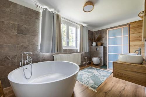 Superbe appartement dans maison bourgeoise avec jardin arboré