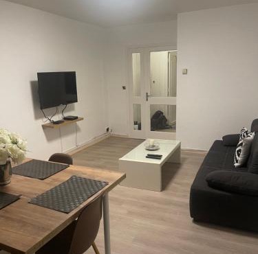 Superbe appartement spacieux avec parking et jardin privé