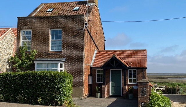 Superbly located cottage with coastal views.