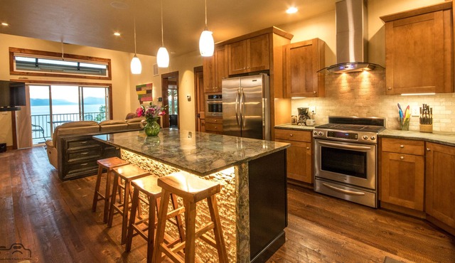Superior view from modern Flathead Lake house. A/C, private dock, boat slip/lift