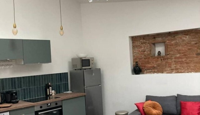 « Sur la Place » Centre Village Confortable et Calme