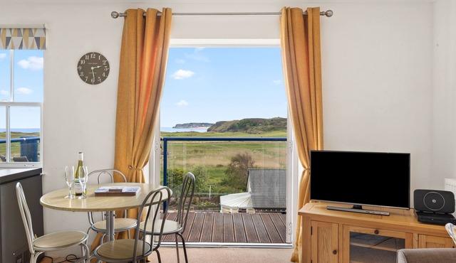 Surf Deck - Lovely Apartment, Spectacular Coastal Views, Short Walk to Beach
