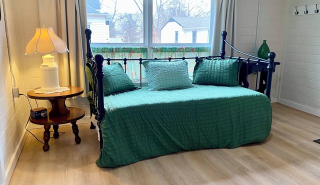 Surprisingly Sunny & Spacious 1 bedroom basement apt. w/King bed + 2 twin beds