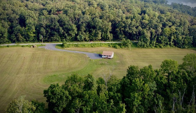Surrounded by quiet fields and woods
