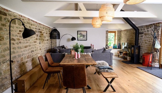 Sussex barn with games room, hot tub and natural swimming pond.