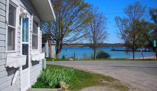Suttons Bay, in town and steps away from beach walk to everything Suttons Bay
