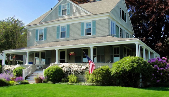 Sweeping waterviews; tranquil, wrap-around porch; walk to beach & shops