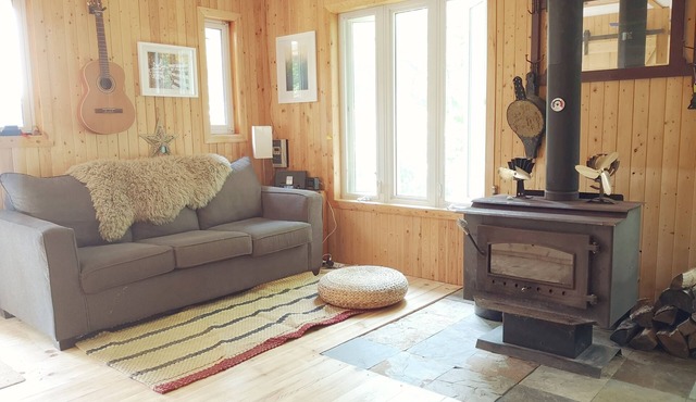 Sweet and cozy cottage nestled in the heart of a serene 10-acre woodland!
