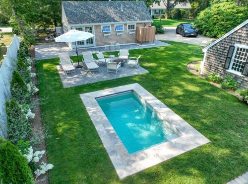 Swing Set Plunge pool and large yard await