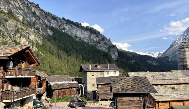 Swiss mountain chalet, wooden interior, cosy, with a beautiful view