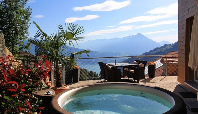 swissmountainview - sunny & quiet - terrace, Jacuzzi, view to lake + mountains