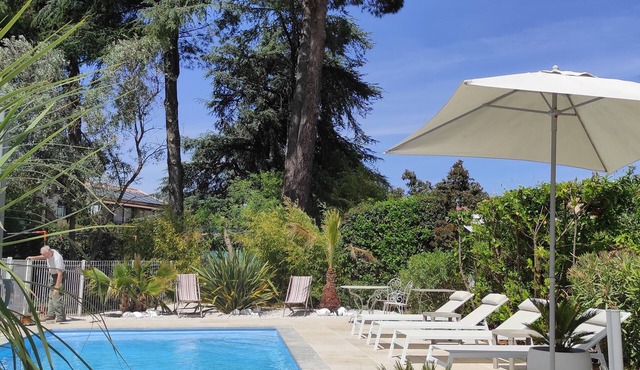 T3 au rdc de Villa Piscine Clim Parking a 8min des Plages