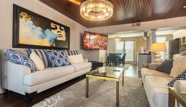 Tailored for comfort and productivity, this two-bedroom executive condo features a full kitchen with premium appliances, an elegant dining room, and spacious living areas. Both bedrooms include plush king beds, full-size closets, and stylish dressers