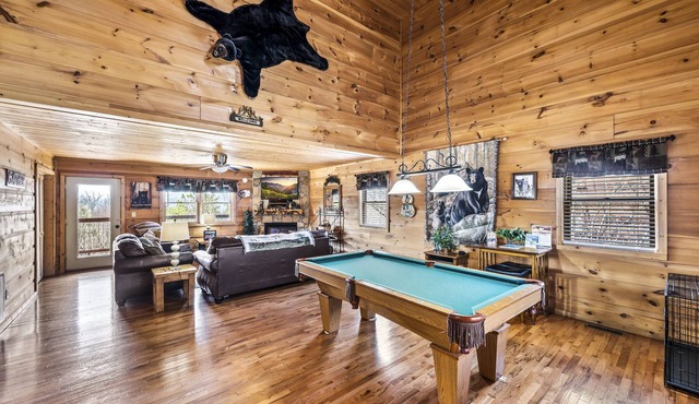 Take in panoramic mountain views in this 3 BR/3 BA cabin with all the amenities