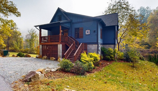Take in the natural beauty from this elegant riverfront home