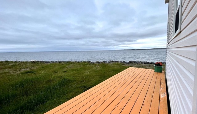 Take it easy at this tranquil getaway, only steps from the beach!