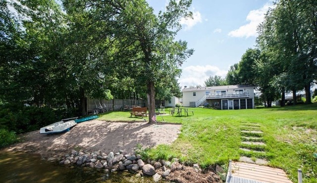 Tamarac Lake Home with Seven Bedrooms and Sand Beach