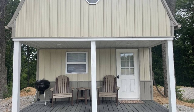 Tan cabin close to University of Central Missouri and Whiteman AF Base