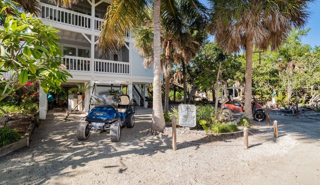 TARPON COVE - Coastal island home on a golf cart only private island