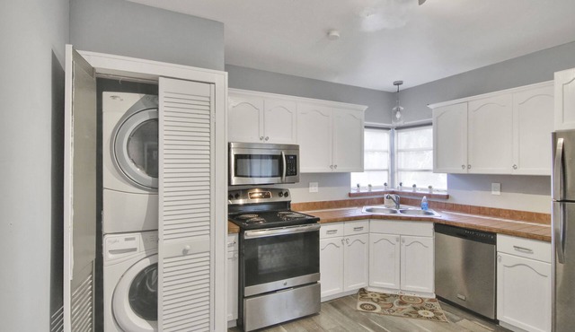 Tarpon River Getaway – Modern 2 BDR on Water w/Shared Pool, 15 Min to Beach!
