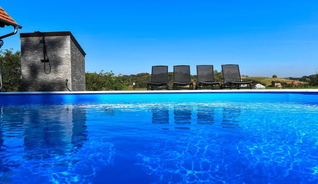 Tasteful property with many amenities and beautiful panoramic views of the countryside.