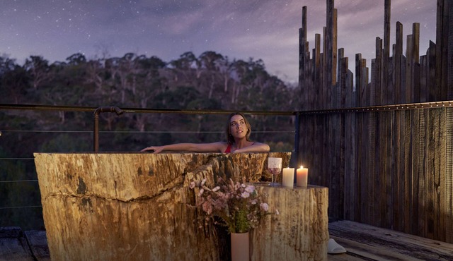 Teetering over a ravine, with a petrified stone bath older than the dinosaurs