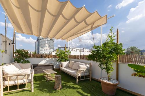 Tentudia Apartments with Private Roof-Top or Patio and Free underground Parking via Car Lift -small Medium- Car By OCityzen