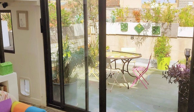 Terrace and veranda: a garden on the 5th floor, atypical and cocooning.