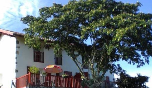 Terraced house between sea and mountain