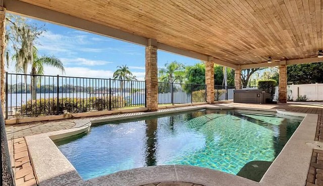 The American Dream House – Lakefront Luxury with 2 Heated Pools & Hot Tub